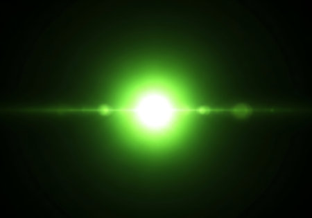 A vibrant green light burst with horizontal flares emanates from the center against a deep black backdrop.の素材