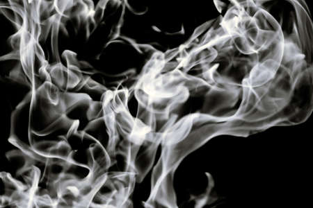 Beautiful white tongues of flame, fire dance, background textureの写真素材