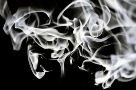 Beautiful white tongues of flame, fire dance, background textureの写真素材