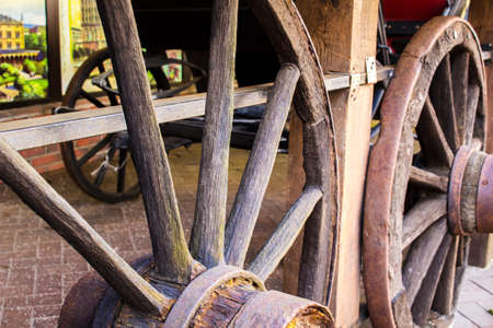 Wooden wheel of an old cartの写真素材