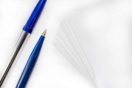 Pen and sheets of paperの写真素材