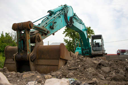 Old scraped excavator bucket