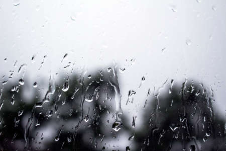 Droplets of rain on the glass background