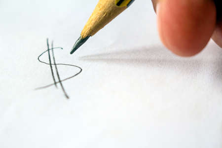 Dollar symbol on white sheet concept photoの写真素材