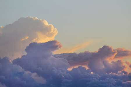 Large cumulus clouds during sunset