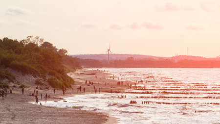 Beach and sea at sunset tonedの写真素材