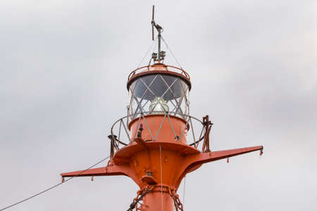old red lighthouseの写真素材