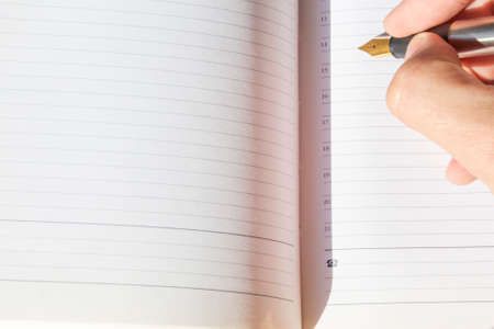 write pen in notebook