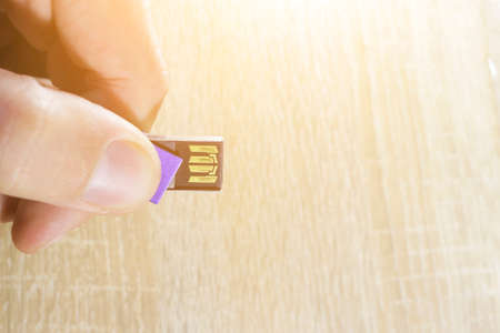 USB flash drive in hand toned