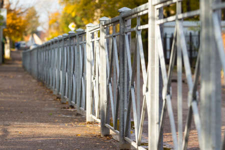 fence along the streetの写真素材