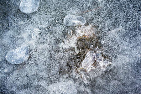 ice surface with bubbles, background, textureの写真素材