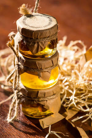 small jars with honey and nutsの写真素材