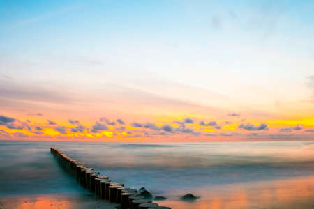Beautiful sunset over the sea on a long exposureの写真素材