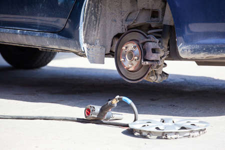 replacement of wheels at a tire fitting shopの写真素材