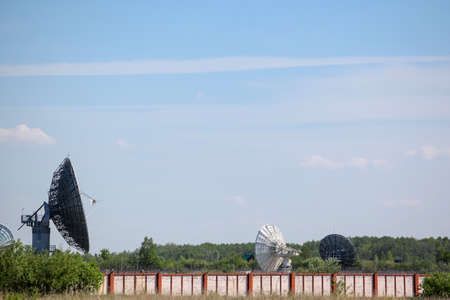 huge satellite dishes in the field