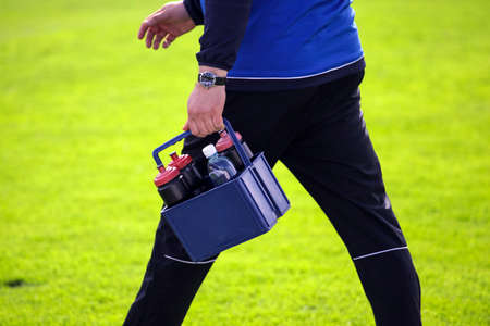 water carrier in a football matchの写真素材