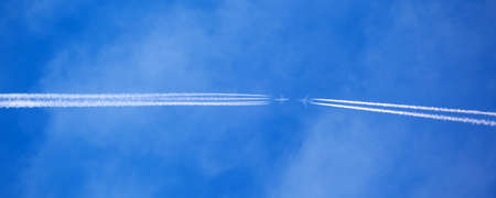 two passenger aircraft are flying towards each other, a second before the crash