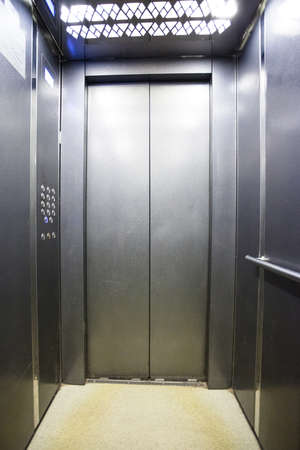 interior of a modern silvery elevator
