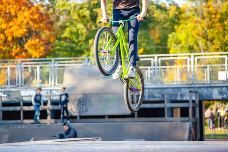 young athlete makes an extreme bike jump on a rampのeditorial素材