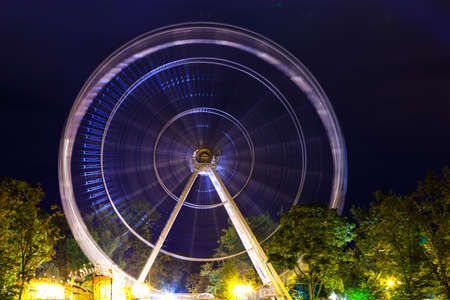 a Ferris wheel in a night park on a long exposureのeditorial素材