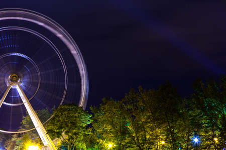 a Ferris wheel in a night park on a long exposureのeditorial素材