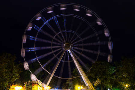 a Ferris wheel in a night park on a long exposureのeditorial素材