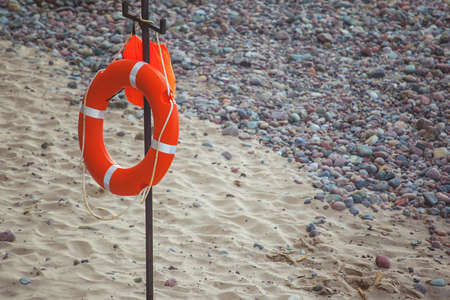 life ring on the beachの写真素材