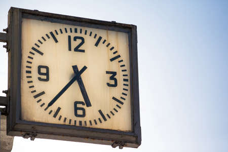 old street clock on the wall