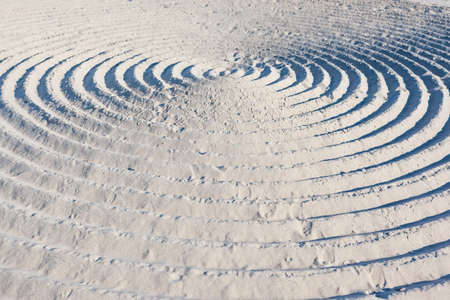 large abstract circles in the sand, background, texture