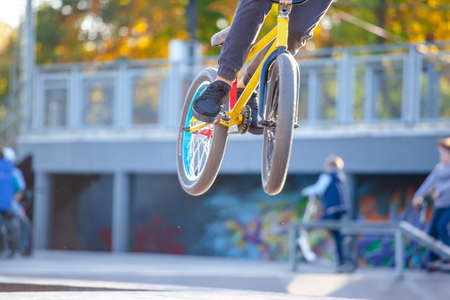 young cyclist makes a spectacular extreme jump on the springboard