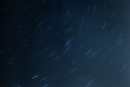 night sky with traces of stars on a long exposure