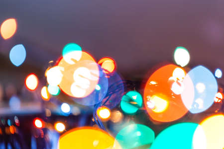 bright colorful lights of christmas garlands, blurred image