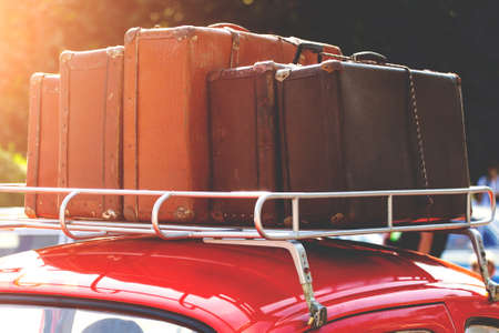 suitcases with things on the roof of the car, retro tonedの写真素材