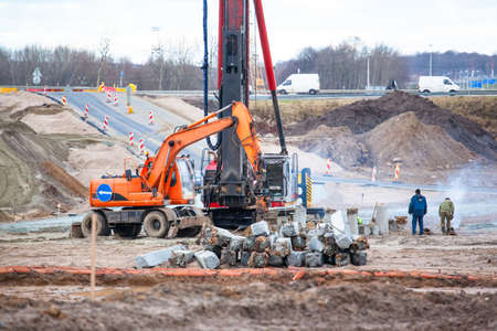special construction equipment digs well for piles