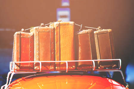 suitcases with things on the roof of the car, retro tonedの写真素材