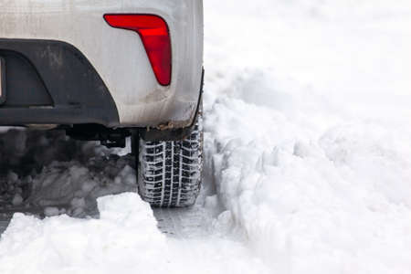 car wheel in a snowdrift