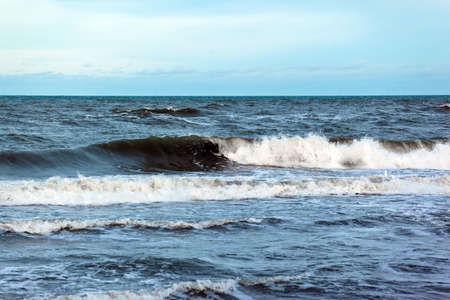 sea surface to the horizon with large waves with foam