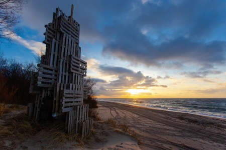 beautiful landscape of sea sandy beach during sunsetの写真素材