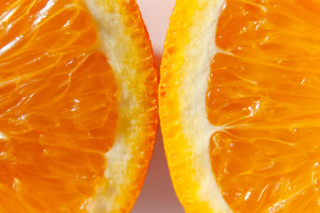 two bright slices of juicy orange, macroの写真素材