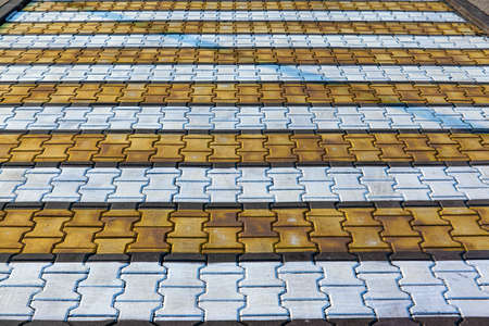 pedestrian crossing markings on paving slabs