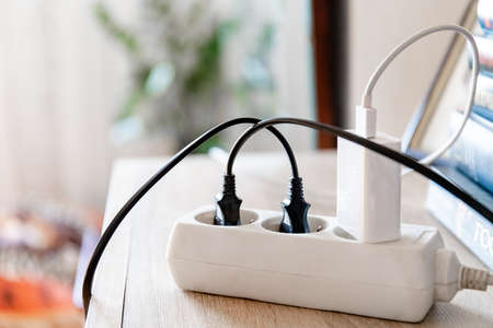 extension cord with electrical appliancesの写真素材