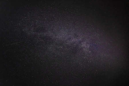 dark night sky with milky way and millions of starsの写真素材