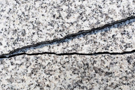 granite surface with crack, background, textureの写真素材