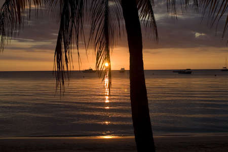 Romantic colorful sunset from a beach in Jamaicaの写真素材