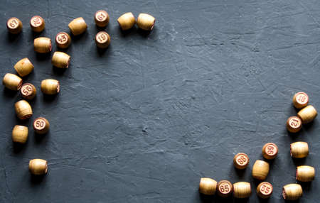 Vintage Lotto barrels are arranged in random order on a dark surface.の写真素材
