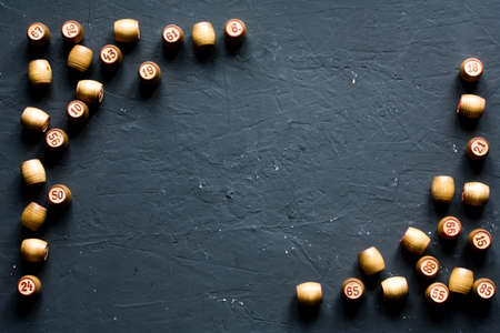 Vintage Lotto barrels are arranged in random order on a dark surface.の写真素材
