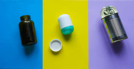 Waste for recycling located on the surface of different colors.の写真素材