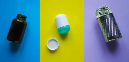 Waste for recycling located on the surface of different colors.の写真素材