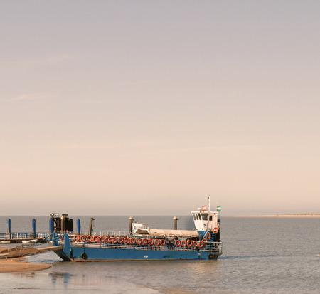 Boat moored at the pier of San Lucar de Barrameda in Cadizの写真素材