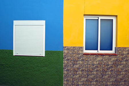Four-color wall with a window on each sideの写真素材
